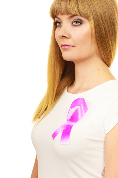 Woman wih pink cancer ribbon on chest  - Foto, imagen