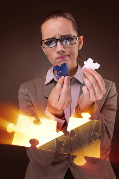 Businesswoman in business concept with puzzle piece - Photo, Image