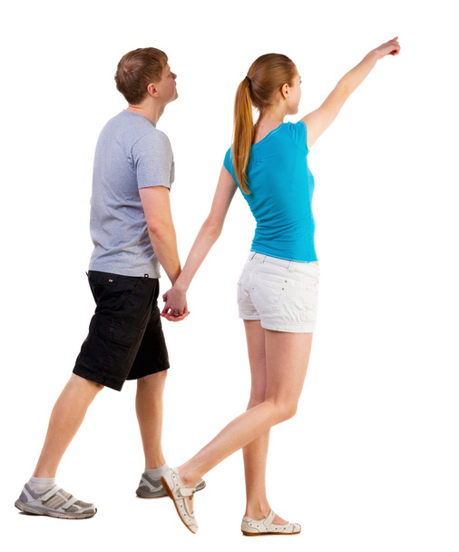 Back view of walking young couple - Photo, Image
