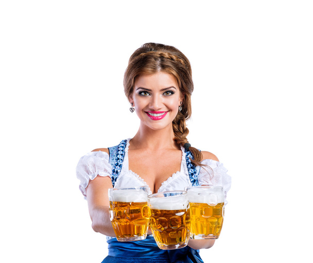 Woman in bavarian dress with beer - Valokuva, kuva