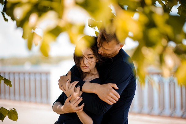 Man comforting his woman outdoor - Fotografie, Obrázek