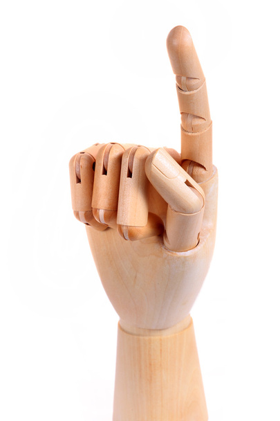 Wooden dummy hand point sign isolated white background - 写真・画像