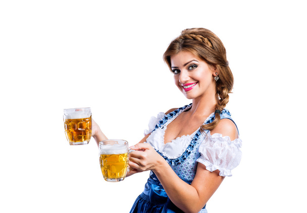 Woman in bavarian dress with beer - Foto, Imagen
