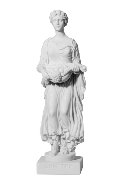 Escultura antiga da mulher quase nua com frutos
  - Foto, Imagem