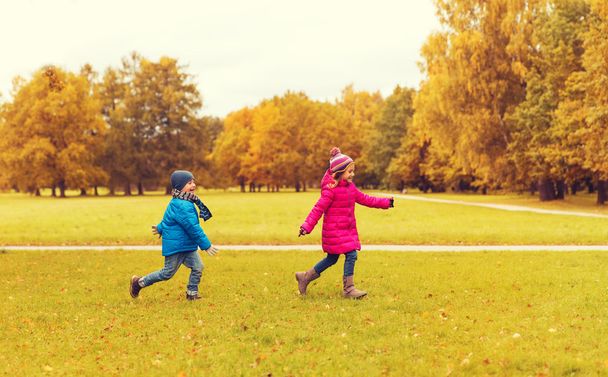 group of happy little kids running outdoors - Zdjęcie, obraz