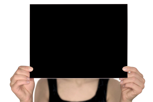 Black paper to a person - Foto, imagen