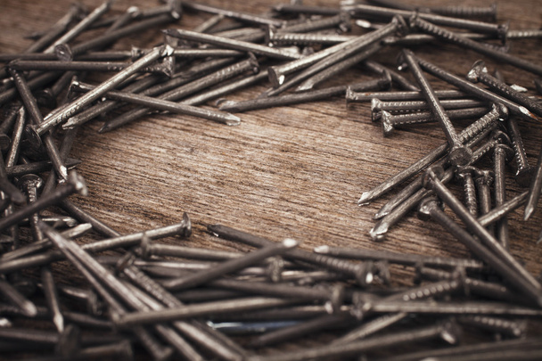 iron nails on wooden background - Photo, Image
