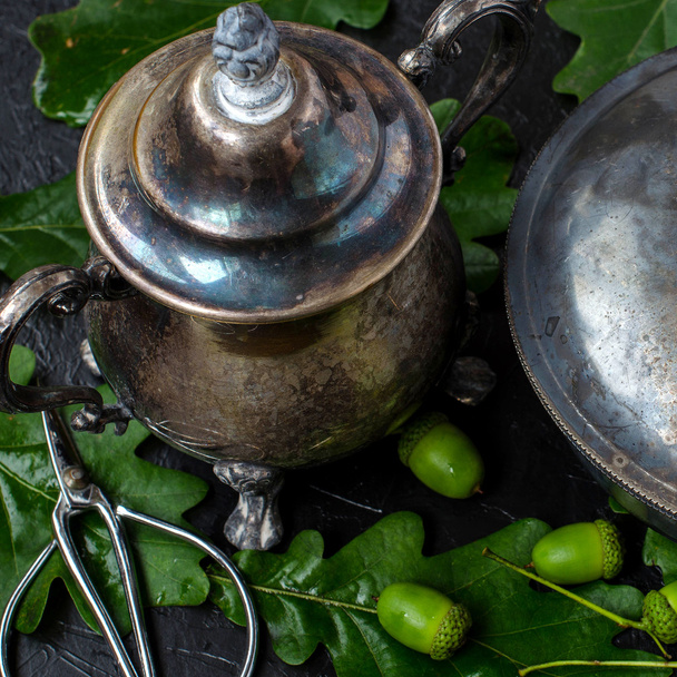 Vintage still life with silver utensils. - Foto, imagen