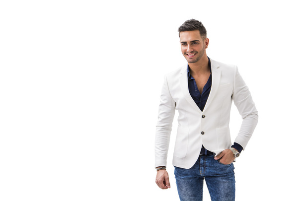 Young smiling man in blue shirt and white jacket - Φωτογραφία, εικόνα