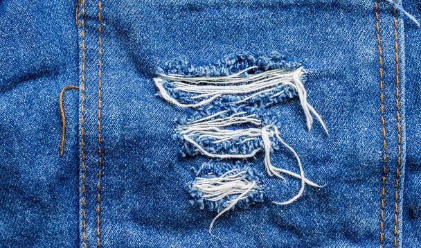 Jeans strappati tasca moda moderna
 - Foto, immagini