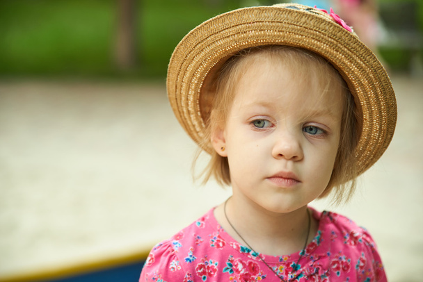 Cute kid girl wearing hat outdoors - 写真・画像
