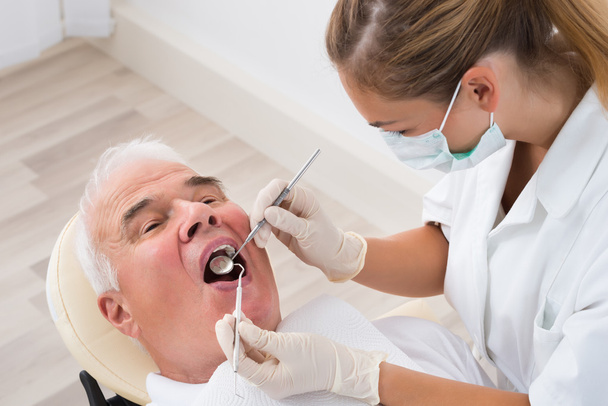 Man Undergoing Dental Treatment - Foto, Imagem