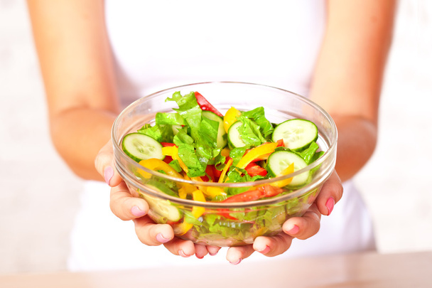 Woman holding salad - Фото, изображение