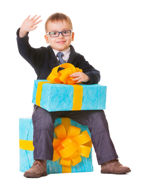 Small boy in spectecles with big present - Photo, image
