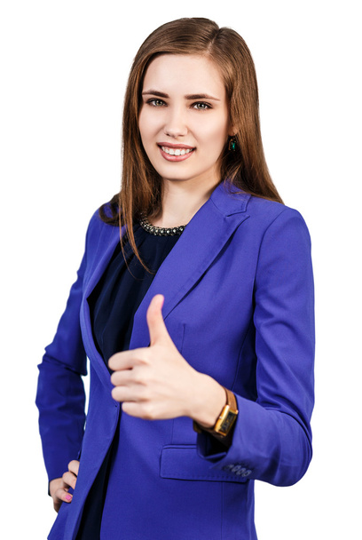 Young woman showing thumbs up - Foto, afbeelding