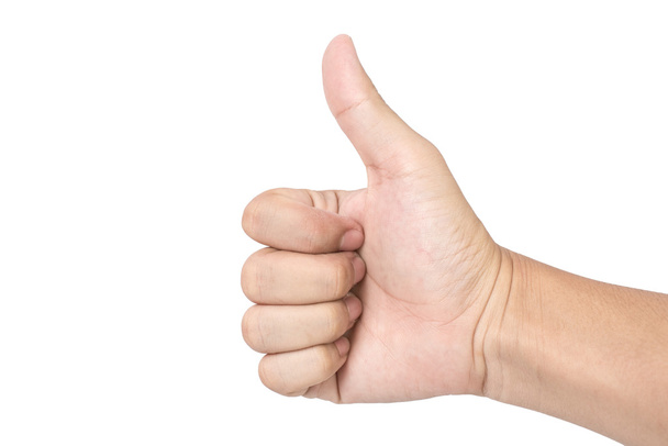 Closeup photo of male hand showing thumbs up sign isolated on white background. Clipping path - Photo, Image