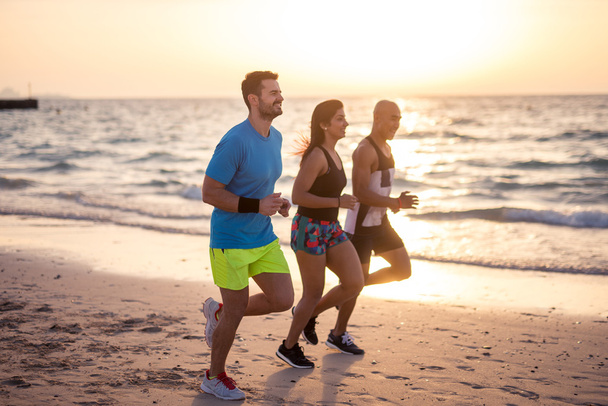 Jogging on the beach - Photo, image