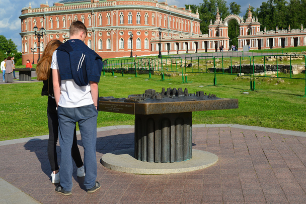 Moscow, Russia - June 08, 2016. Tourists near palace layout in museum estate of Tsaritsyno - Photo, image