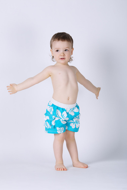 jongetje blij met zwemmen pak - Foto, afbeelding