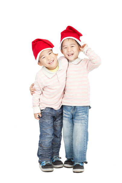 Happy asian kids with Christmas hats - Φωτογραφία, εικόνα