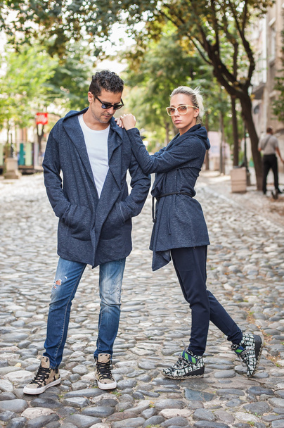 Blonde woman and handsome man posing on the street - Photo, Image