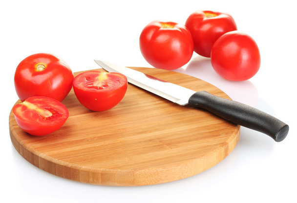 Ripe red tomatoes and knife on cutting board isolated on white - Photo, Image