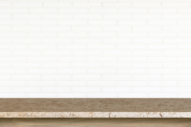 Empty top of stone table on white brick wall background - Foto, afbeelding