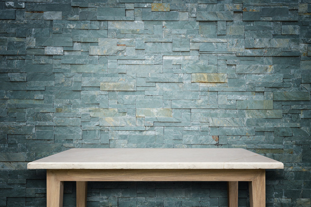 Empty top of natural stone table and stone wall background - Valokuva, kuva