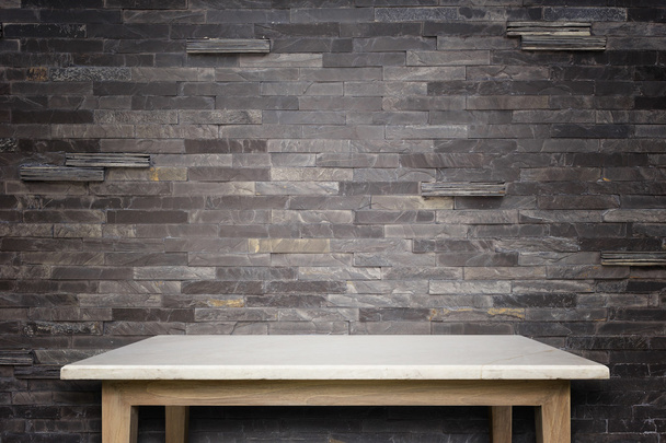 Empty top of natural stone table and stone wall background - 写真・画像