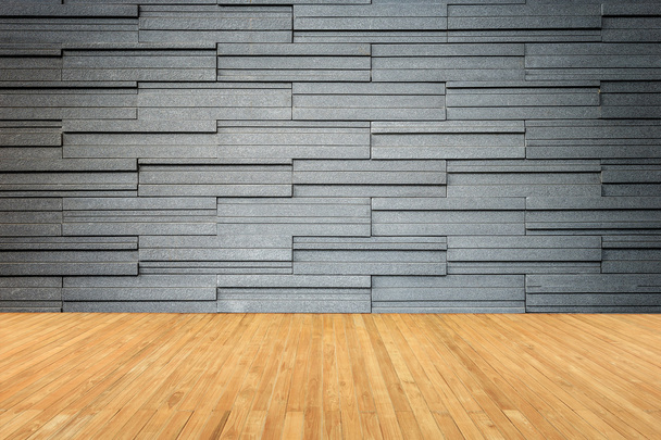 Piano vuoto del pavimento in legno e parete in pietra naturale
 - Foto, immagini