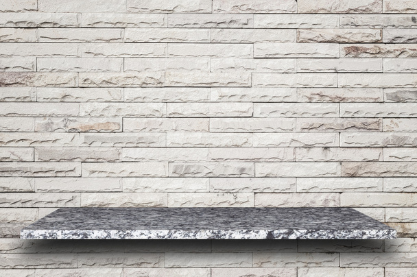 Empty top of natural stone shelves and stone wall background - Photo, Image