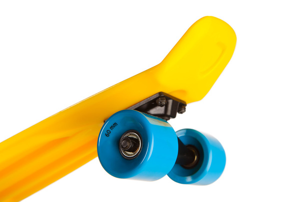 желтый пенни скейтборд часть, изолированные на белом
 - Фото, изображение