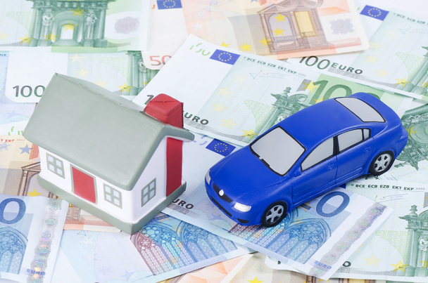 Toy house and the car for euro banknotes - Photo, image