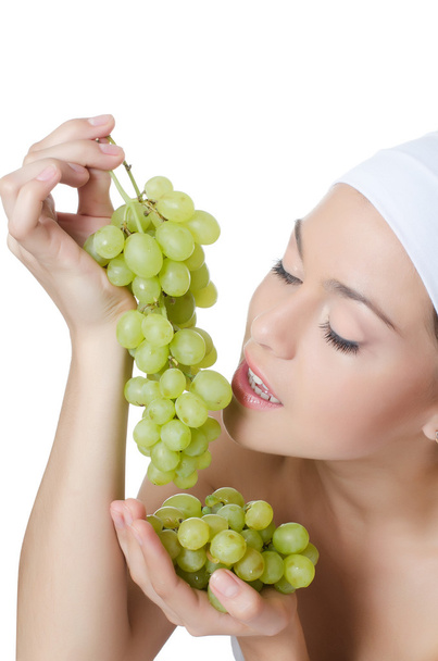 The beautiful woman with grapes - Фото, зображення