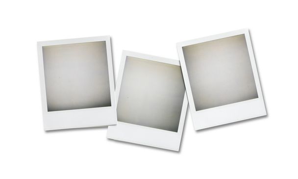 Three blank polaroid pictures overhead isolated on white with cl - Photo, Image