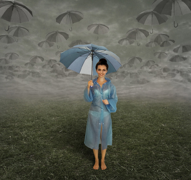 Rainy season and a girl. - Фото, изображение