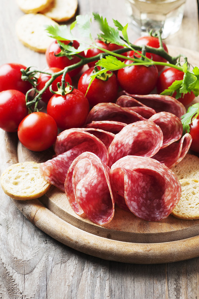Salami with tomatoes and bread - Photo, image