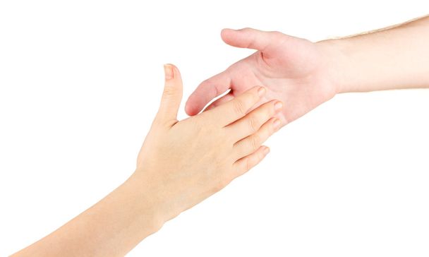 Women's hand goes to the man's hand on white background - Foto, Bild