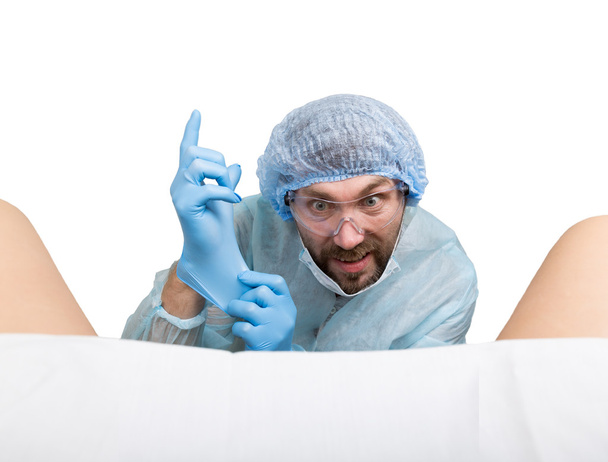 crazy gynecologist examines a patient. mad doctor expression different emotions and makes different hands signs - Photo, Image