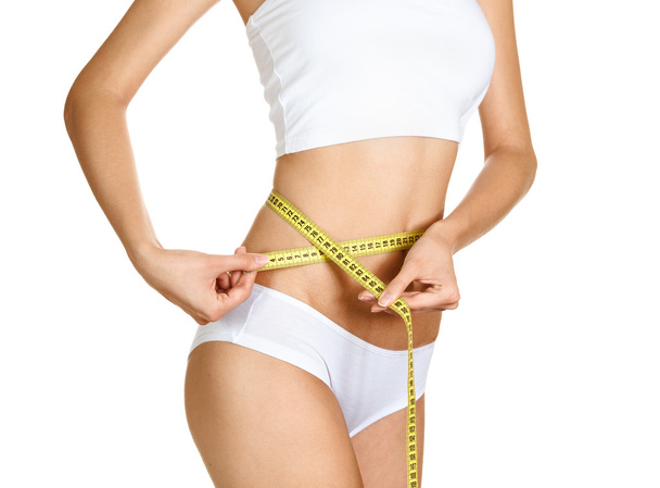 Woman measuring her waistline. Perfect Slim Body. Diet - Valokuva, kuva