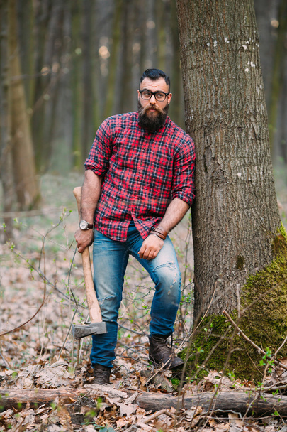 Bearded lumberjack in the woods - Photo, Image