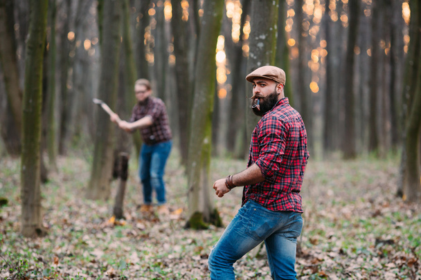 young men in forest - Foto, afbeelding