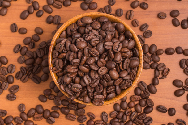 Granos de café en un tazón
 - Foto, imagen