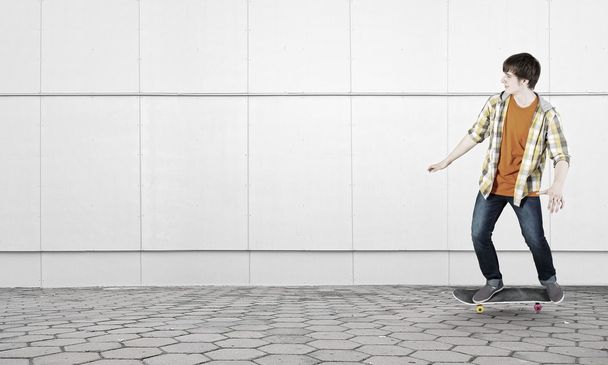 Boy ride skateboard . Mixed media - Фото, зображення