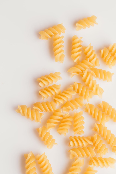 Dry Italian pasta on a white background - Photo, Image