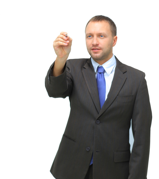Businessman holds a marker and writes in air, suitable to add your own graph - Foto, afbeelding