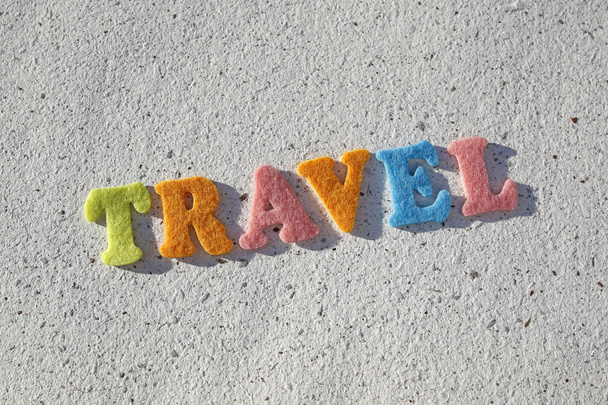 travel word on handmade paper texture - Fotó, kép