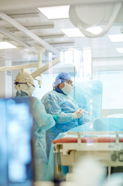 Surgeon in operating room - Photo, image