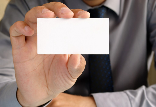 Business card in hand, a businessman - Photo, Image