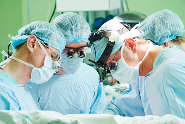 male cardiac surgeon at child cardiosurgery operating room - Fotoğraf, Görsel